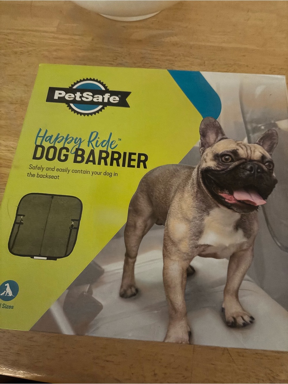 PetSafe Happy Ride Dog Barrier in Green and Blue Packaging